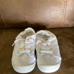 Brand new size 1 girls slip on sneakers.